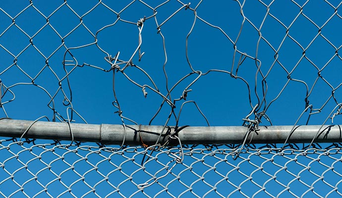 Damaged chain link fence