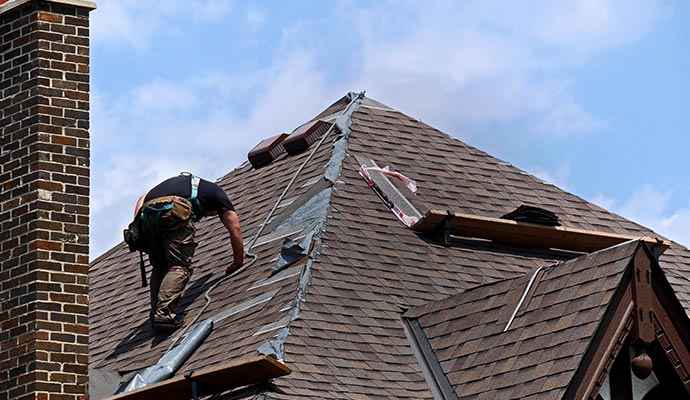 A person is repairing roof