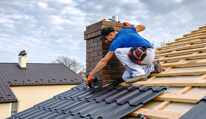 professional man re-roofing service