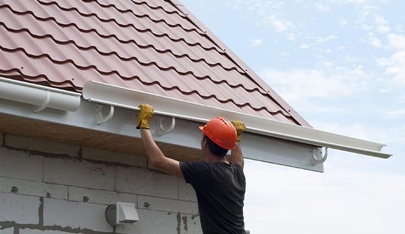professional man residential home gutter installation services