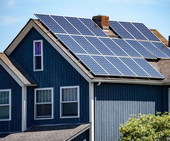 Professionally installed solar panels on the roof of a residential house