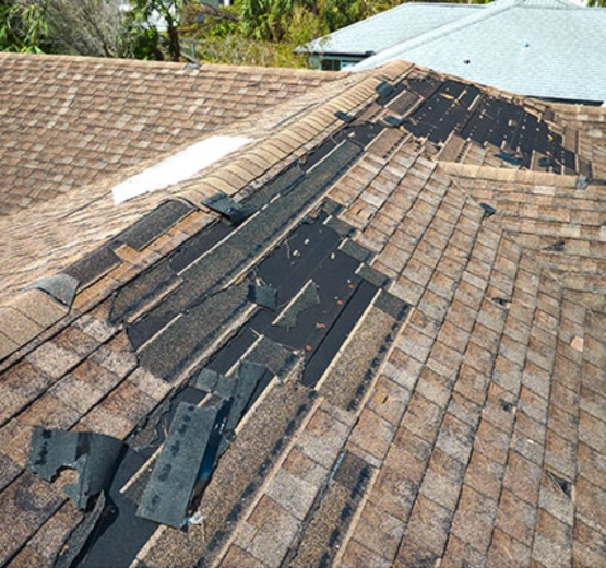 Storm damaged residential roof